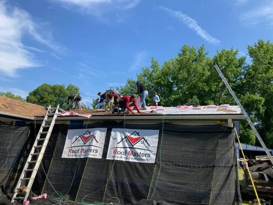 Roof Masters Roofing Solutions Logo