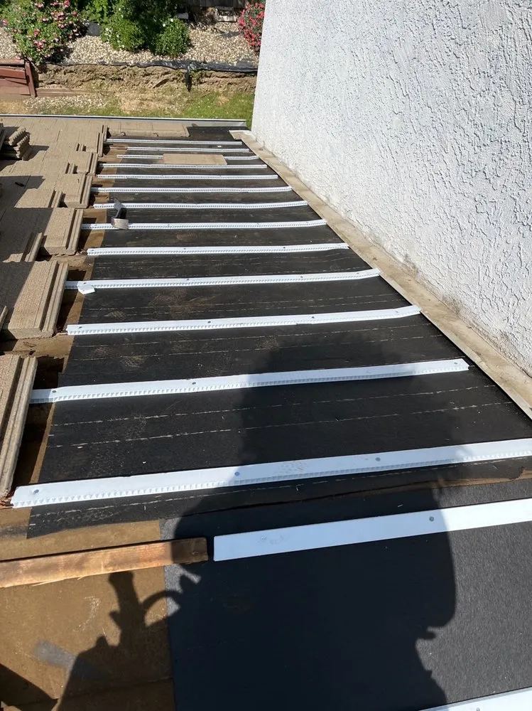 Slide of Roof Recovery