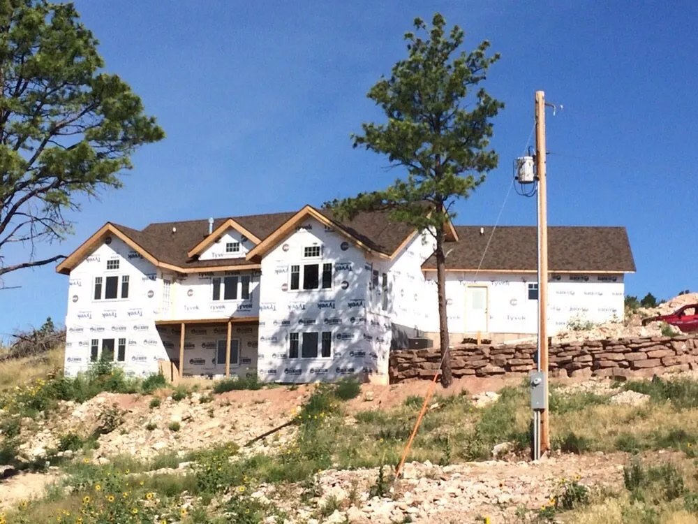 Slide of Roof Riders Roofing Company