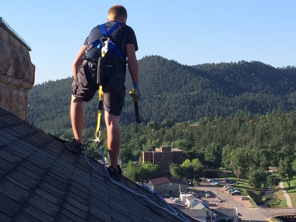 Slide of Roof Riders Roofing Company