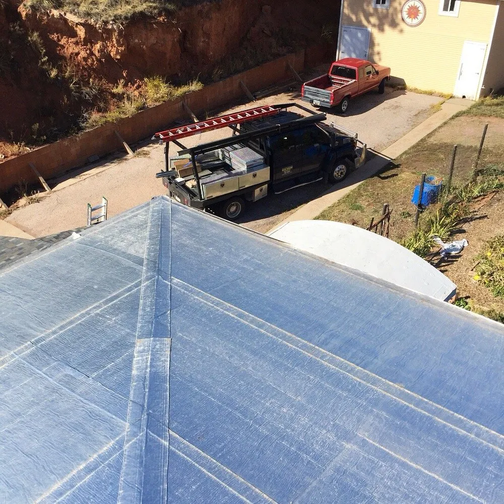 Slide of Roof Riders Roofing Company