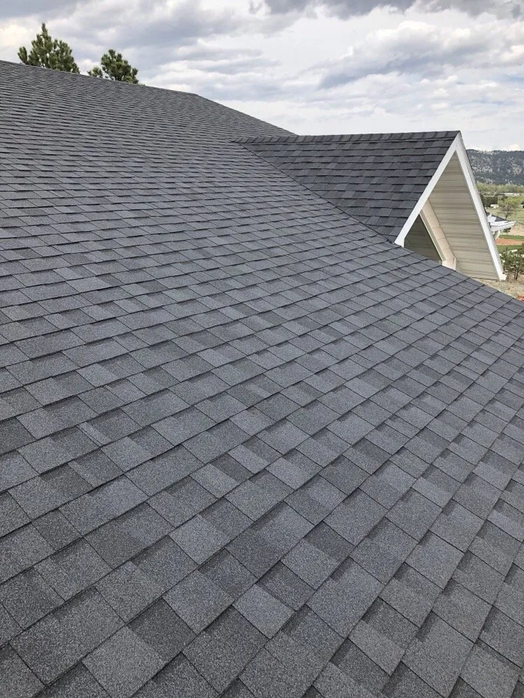 Slide of Roof Riders Roofing Company