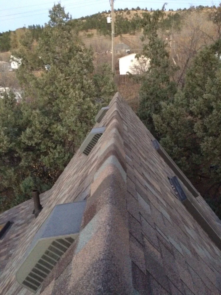 Slide of Roof Riders Roofing Company