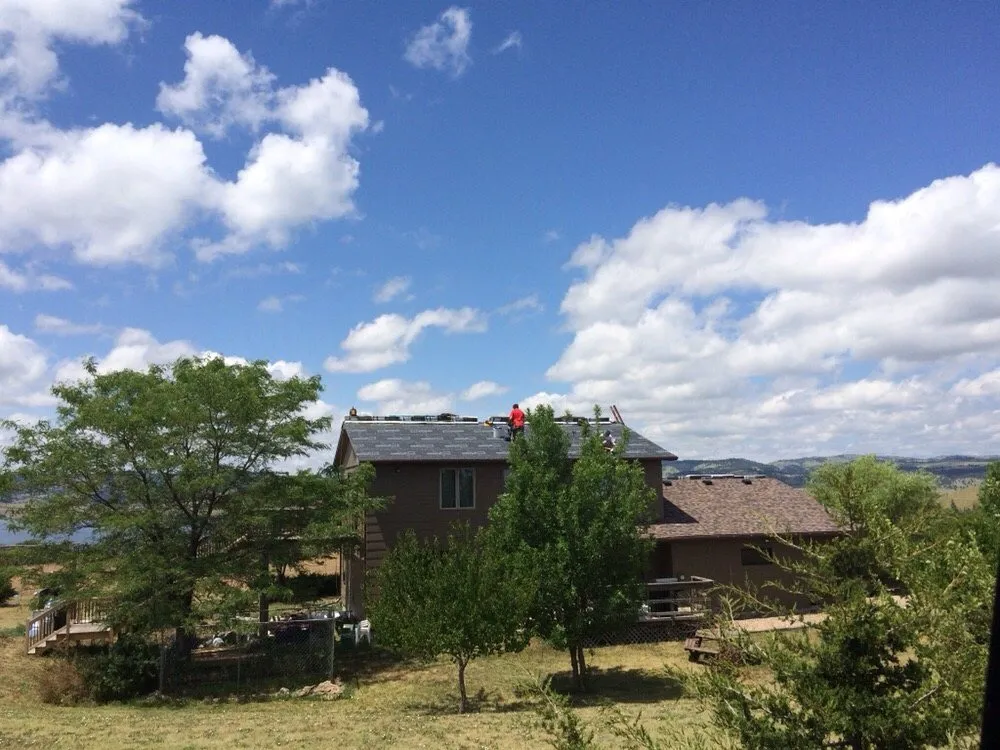 Slide of Roof Riders Roofing Company