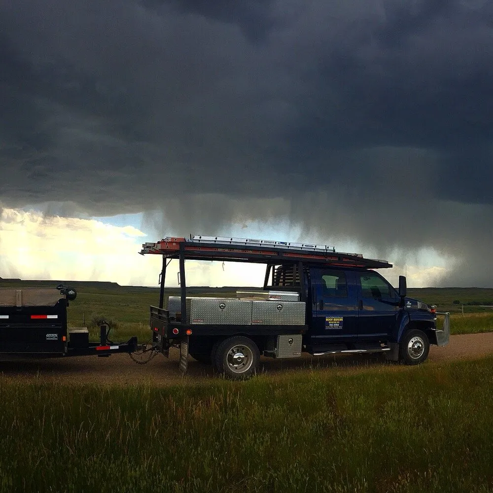 Slide of Roof Riders Roofing Company