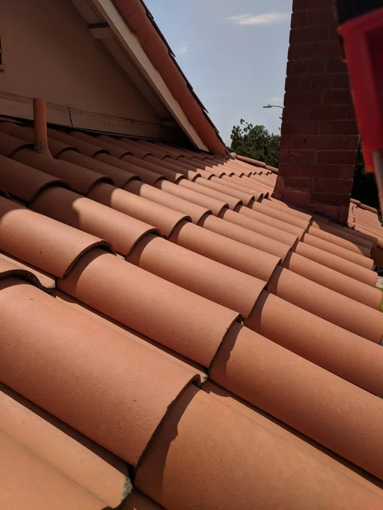 Slide of Roof Tile Pros