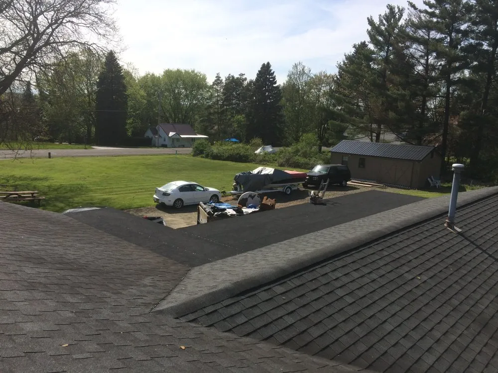 Slide of Roof Top Maintenance & Gutter Services
