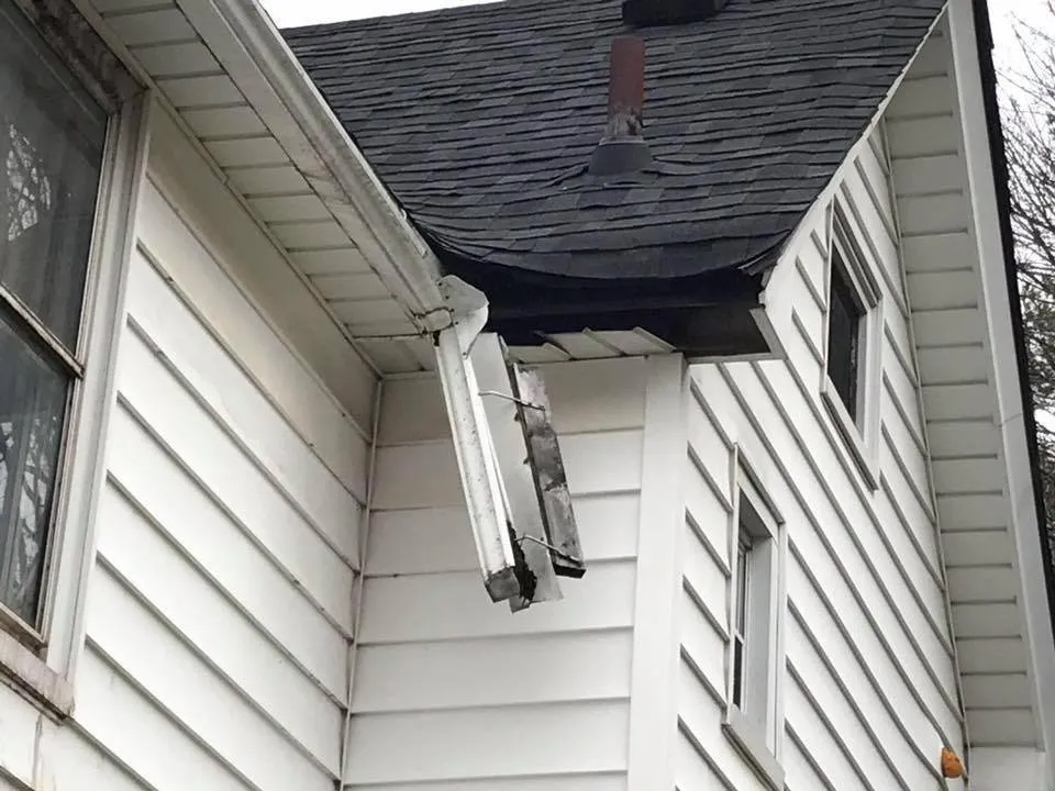 Slide of Roof Top Maintenance & Gutter Services