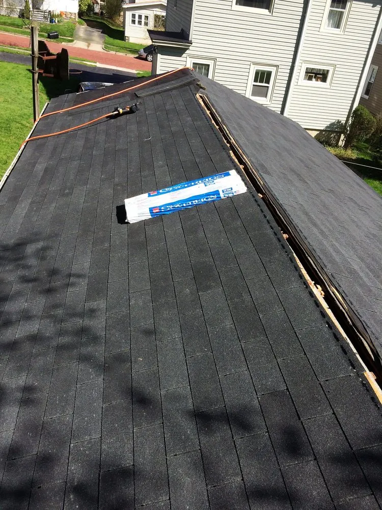 Slide of Roof Top Maintenance & Gutter Services