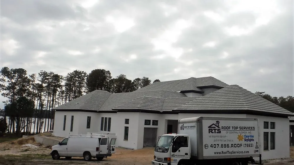 Slide of Roof Top Services of Central Florida