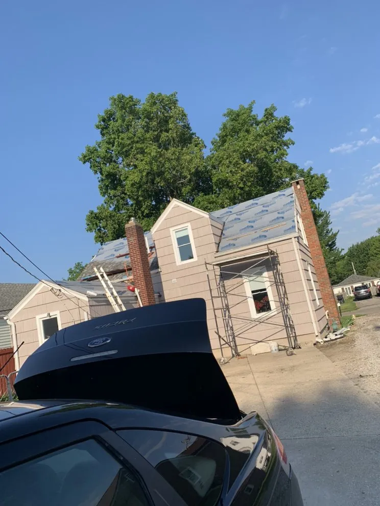 Slide of Roof Walkers Roofing