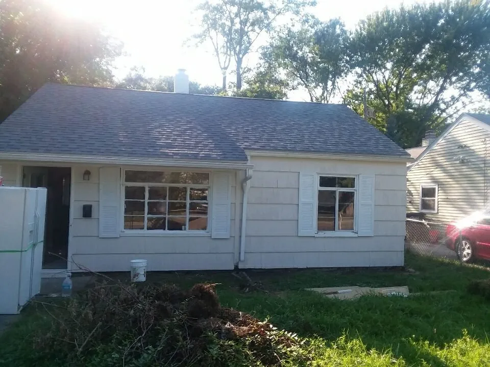 Slide of Roof Walkers Roofing