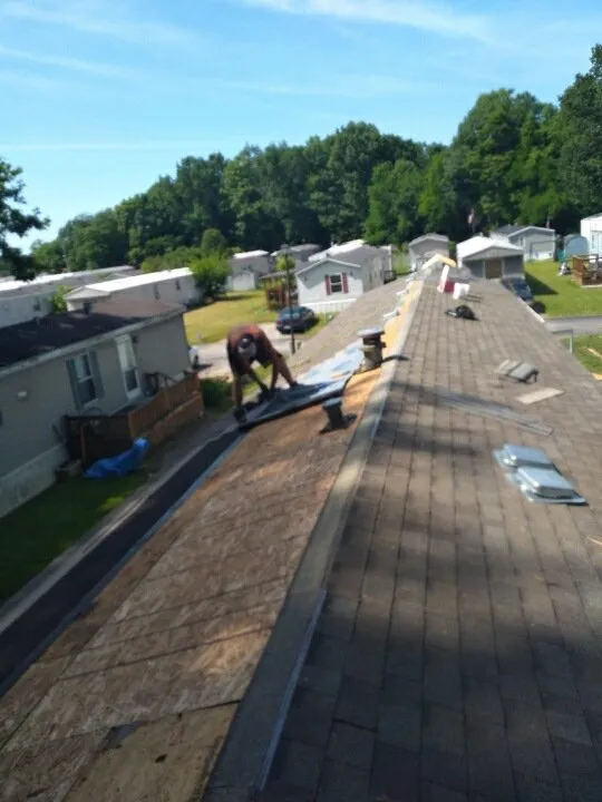 Slide of Roof Walkers Roofing