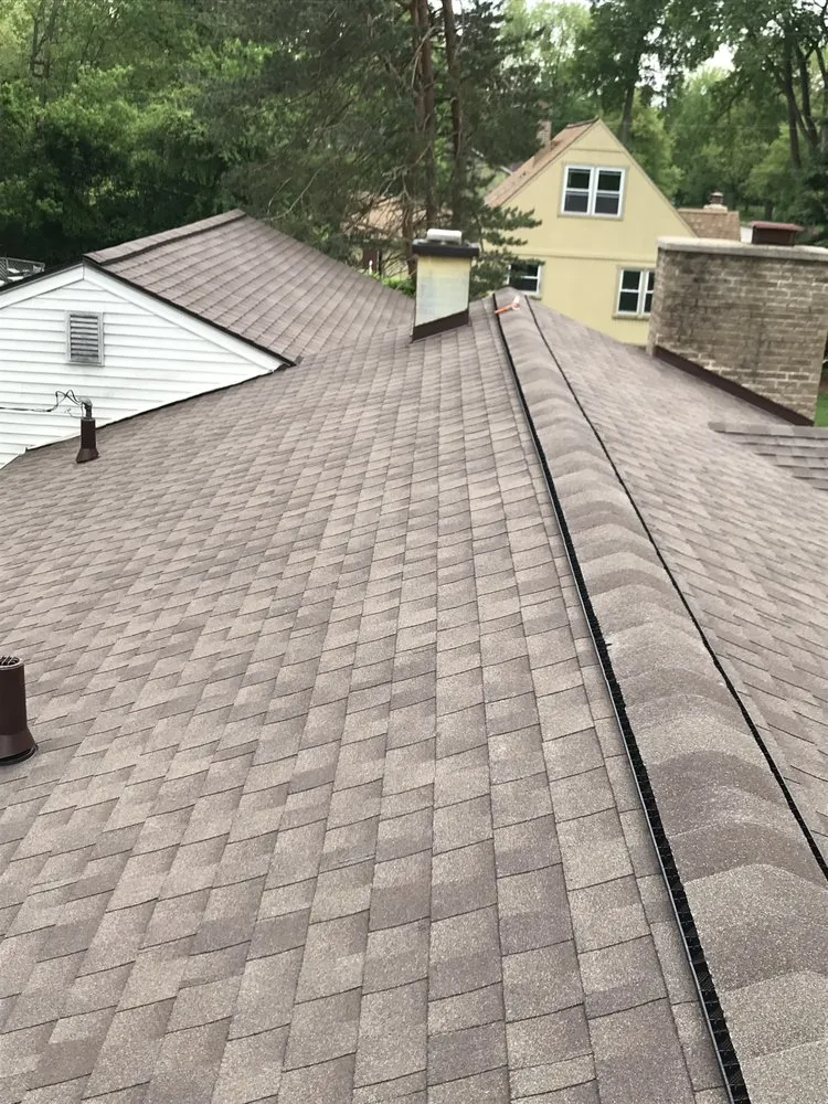 Local flat roof repair in White Lake charter Township, MI by Roofing and Repairs