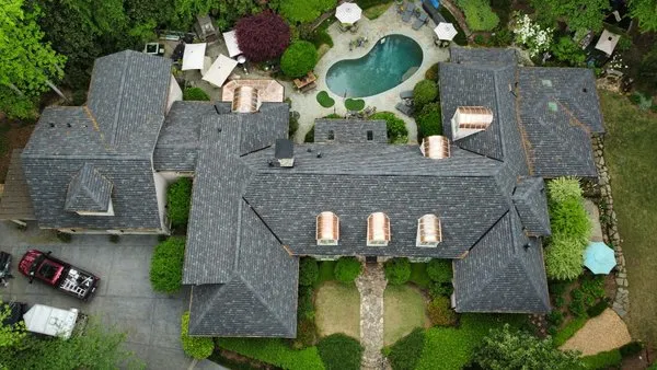Roofing and Restoration by Breiding Logo