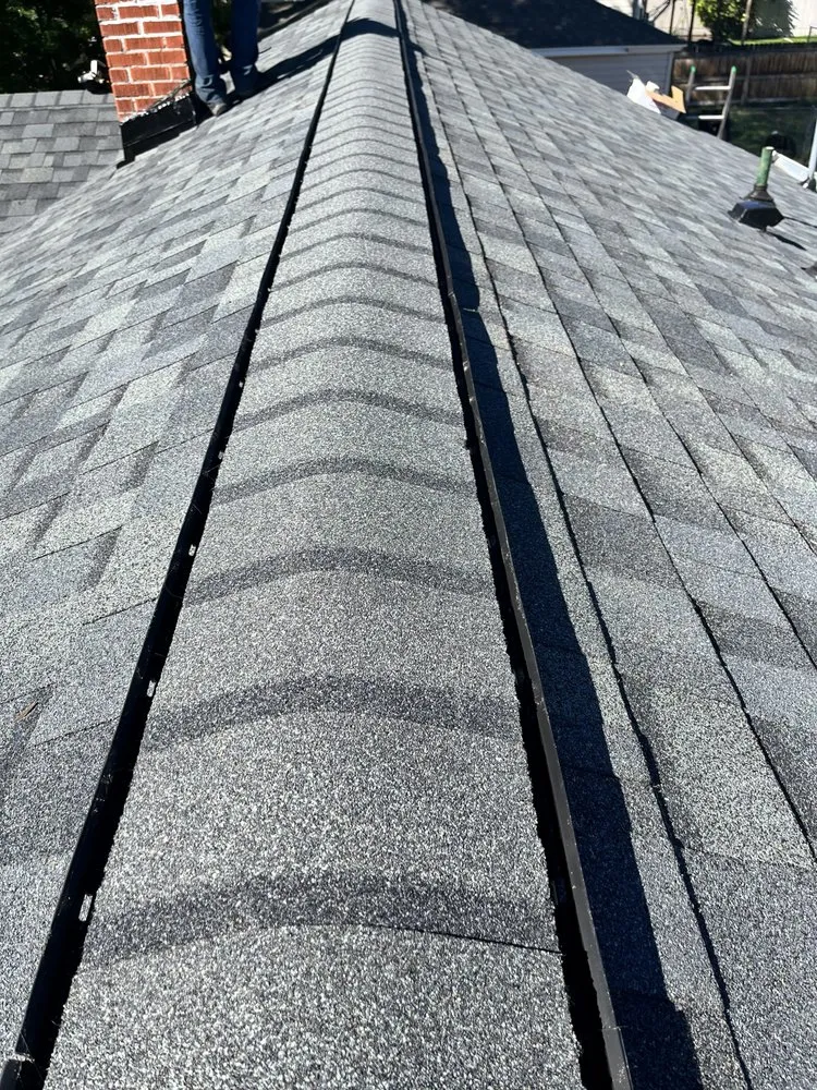 Slide of Roofing Associates