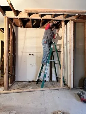 Roofing by Regency Residential Home improvements Logo