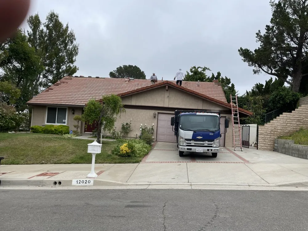 Slide of Roofing Contractors Inc