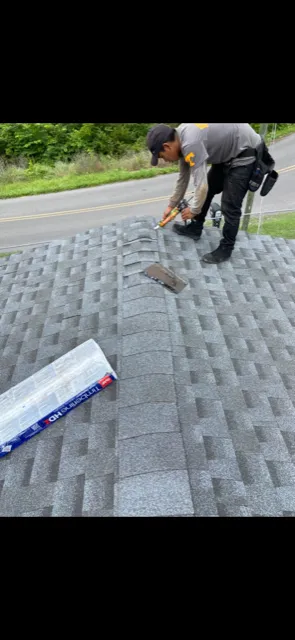 Slide of Roofing Crew
