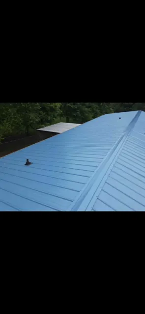 Slide of Roofing Crew