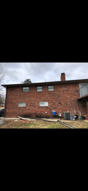 Slide of Roofing Crew