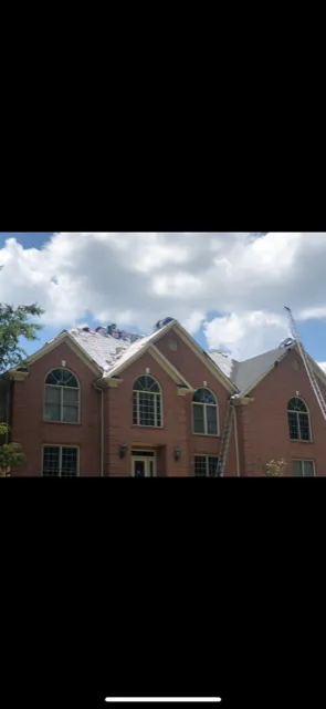 Slide of Roofing Crew