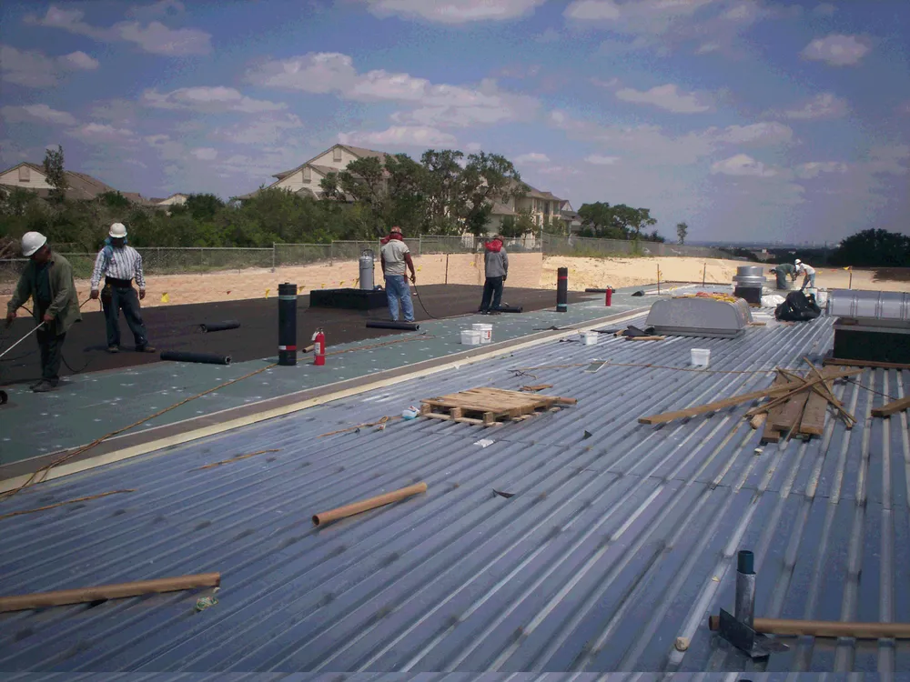 Slide of Roofing Giant