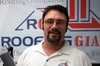 Slide of Roofing Giant