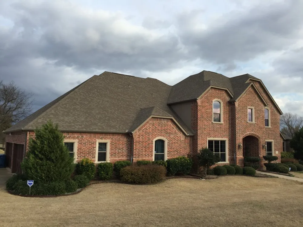 Slide of Roofing Giant