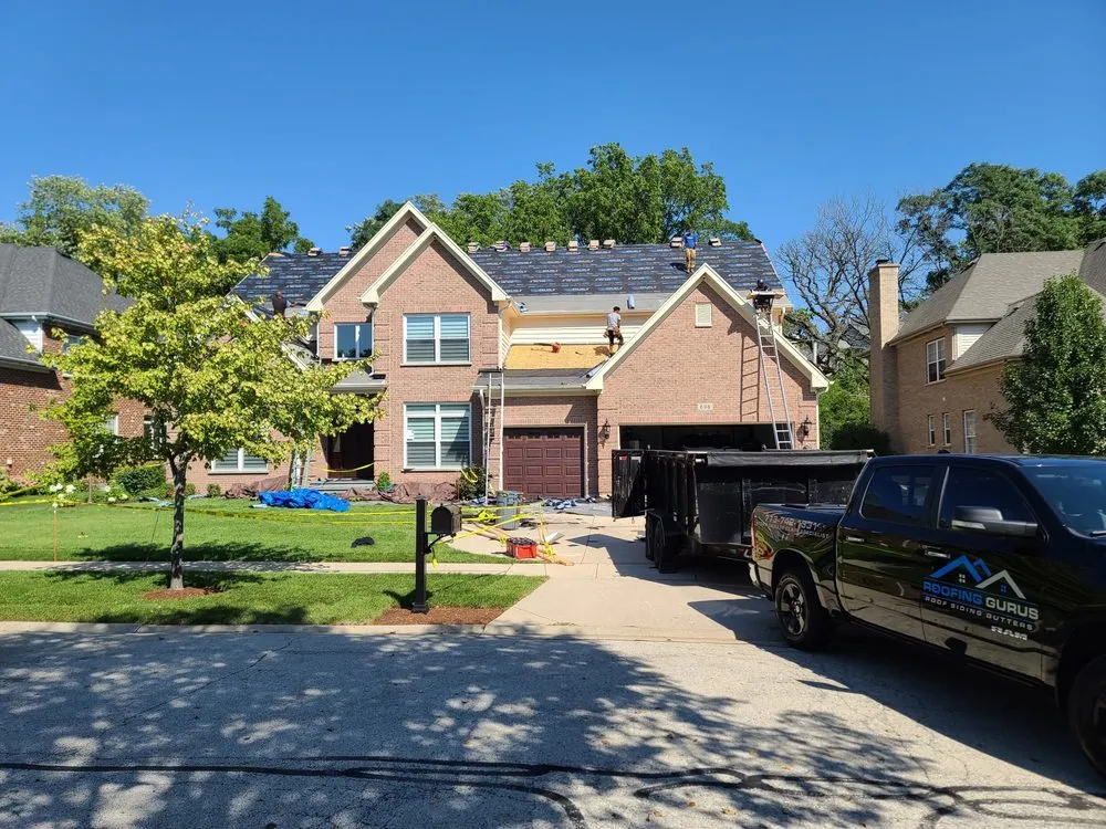 Slide of Roofing Gurus