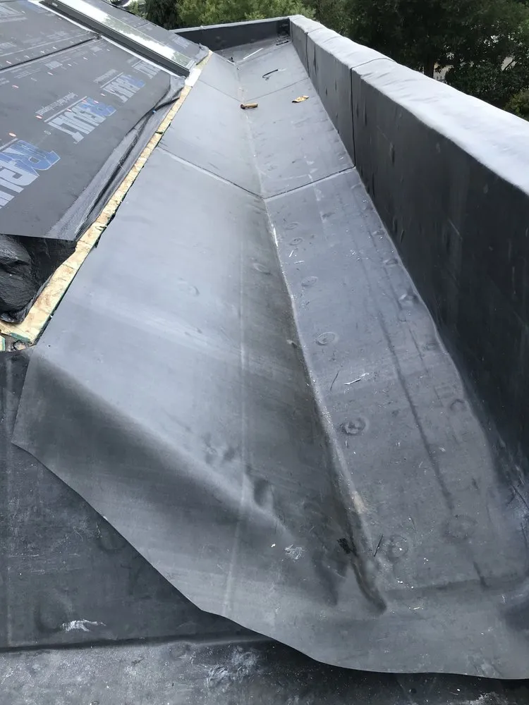 Slide of Roofing Hermanos Iraheta