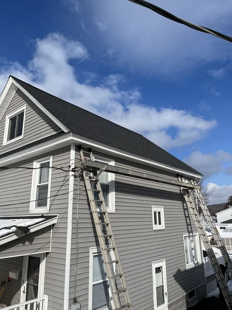 Slide of Roofing King