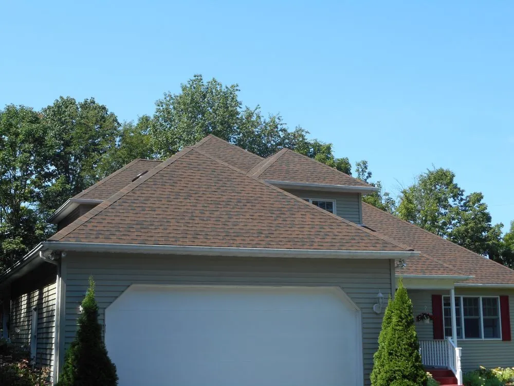 Slide of Roofing Plus