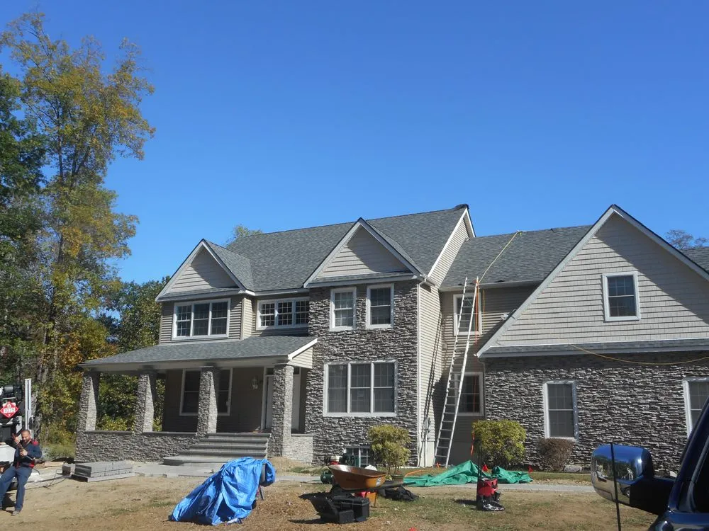 Slide of Roofing Plus