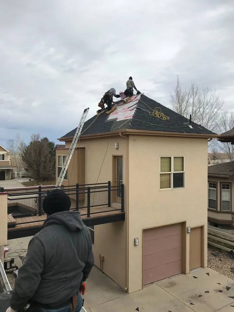 Slide of Roofing Pros