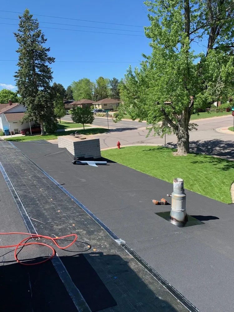 Slide of Roofing Pros