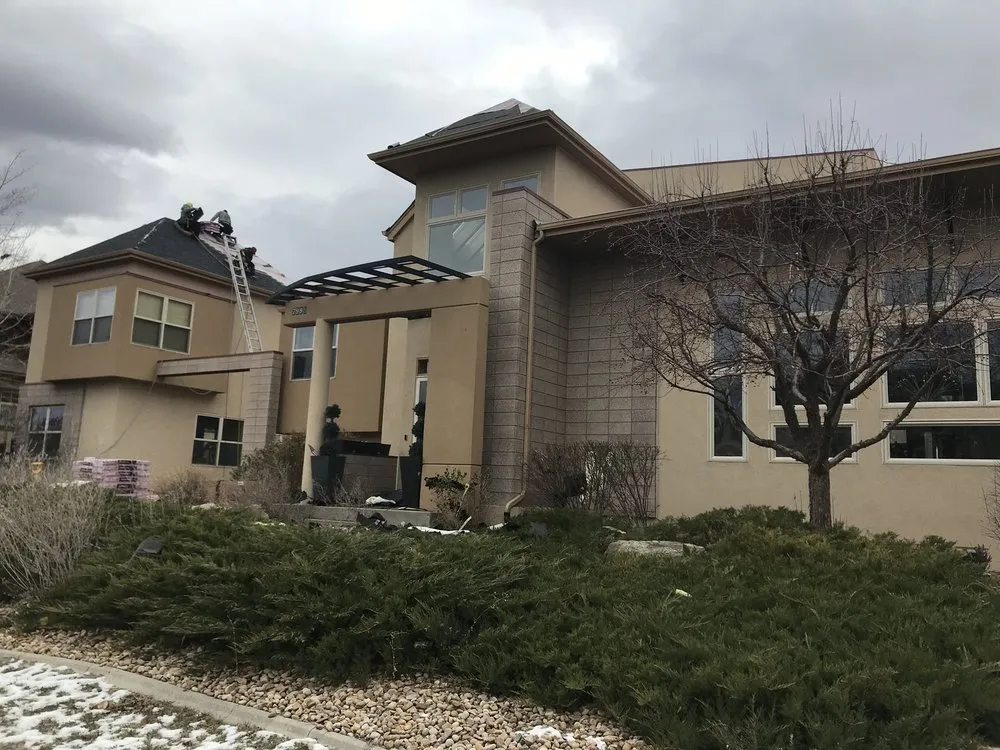 Slide of Roofing Pros