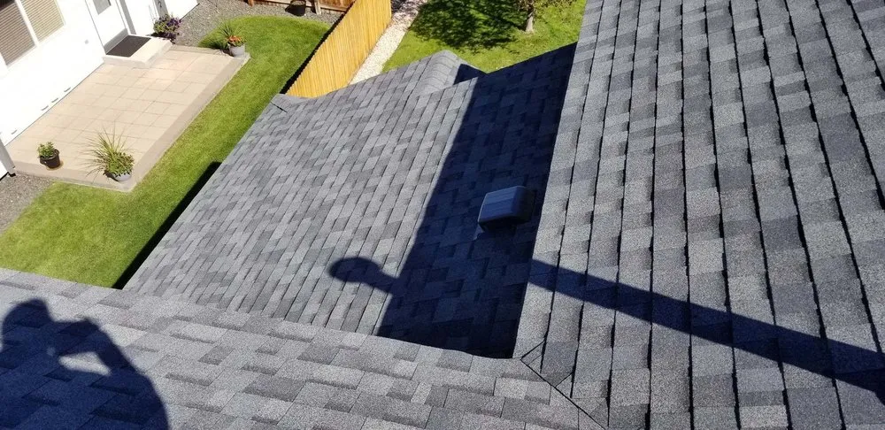 Slide of Roofing Pros
