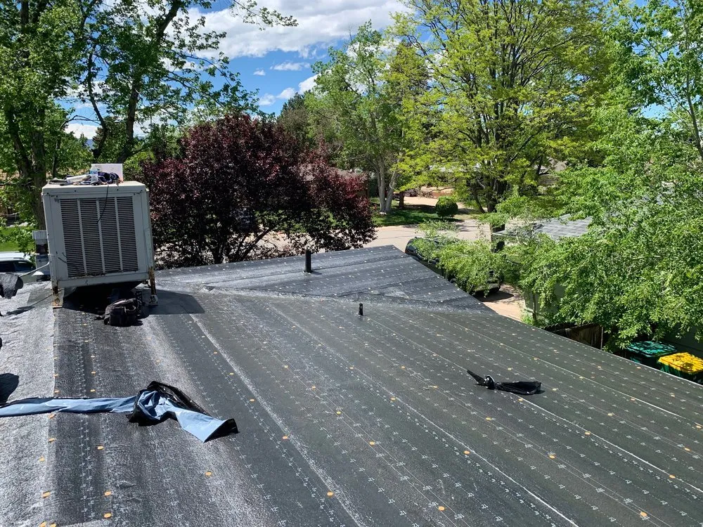 Slide of Roofing Pros