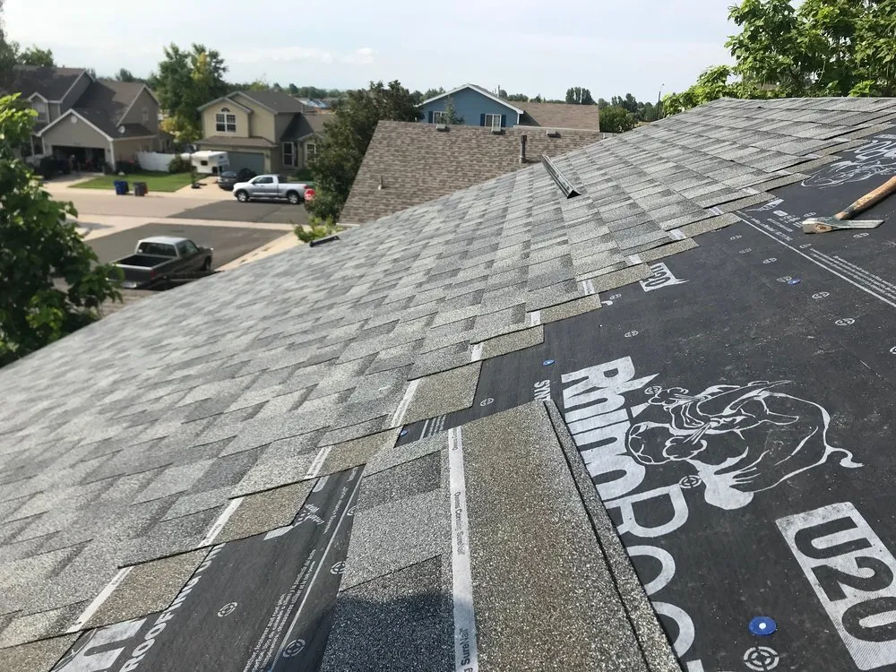 Slide of Roofing Pros