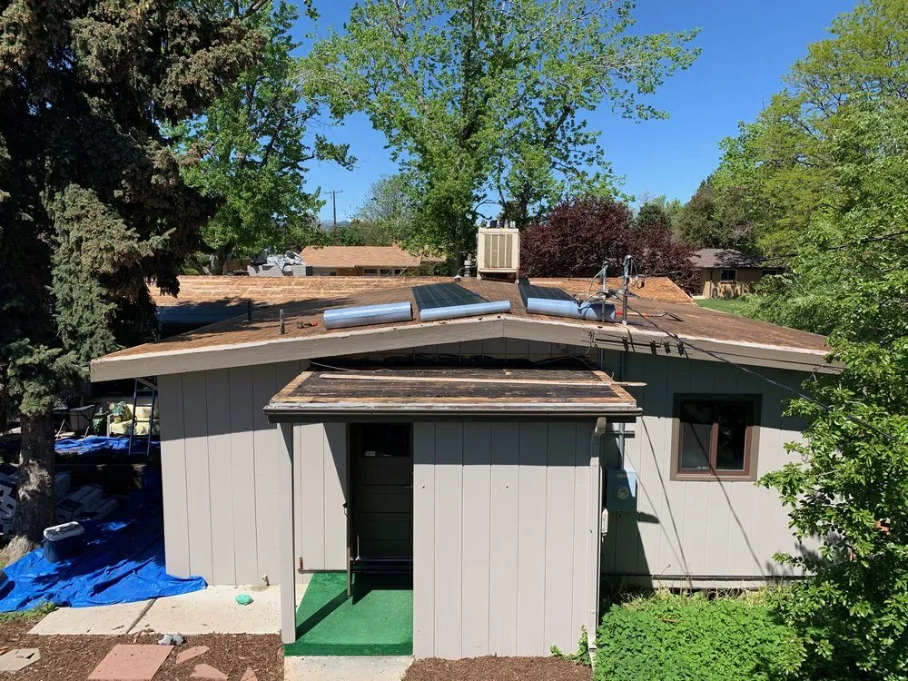 Slide of Roofing Pros