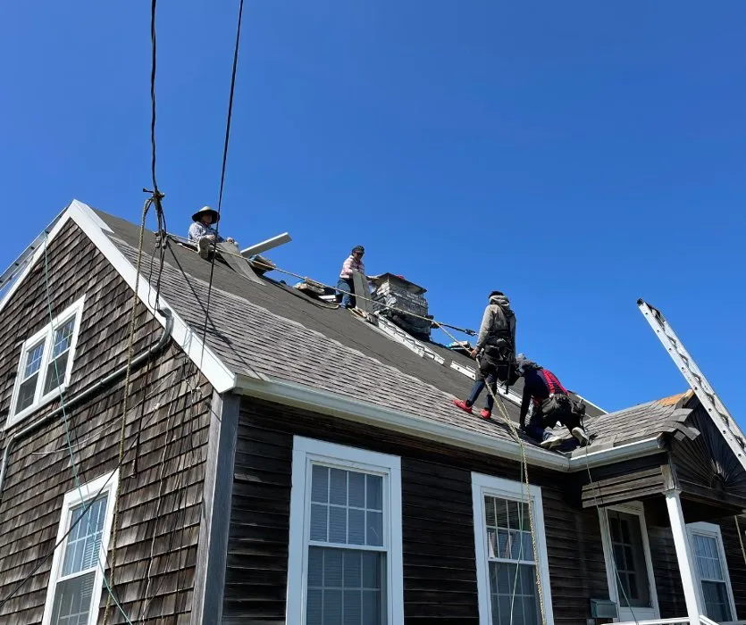 Slide of Roofing Pros Plus
