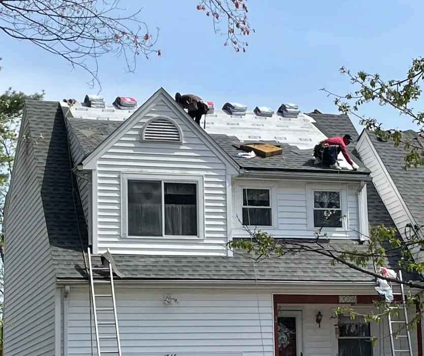 Slide of Roofing Pros Plus