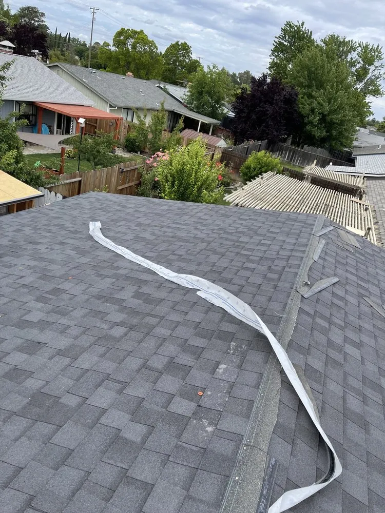 Slide of Roofing Pro's