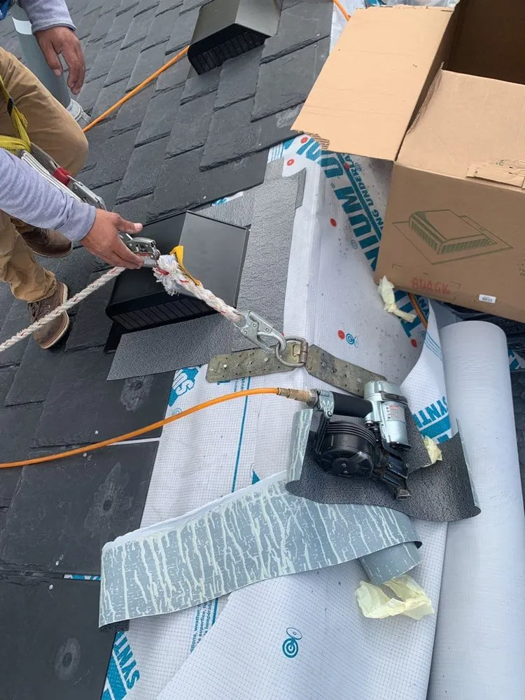 Slide of Roofing Service Company