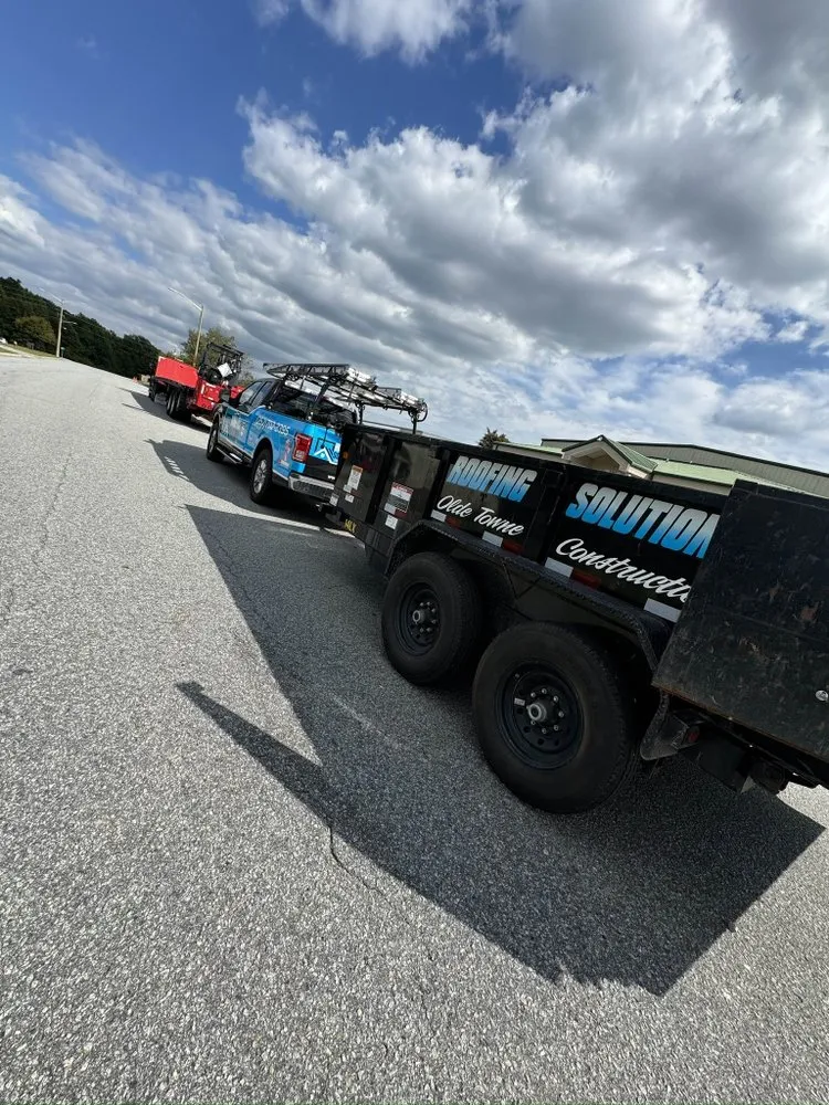 Slide of Roofing Solutions NC