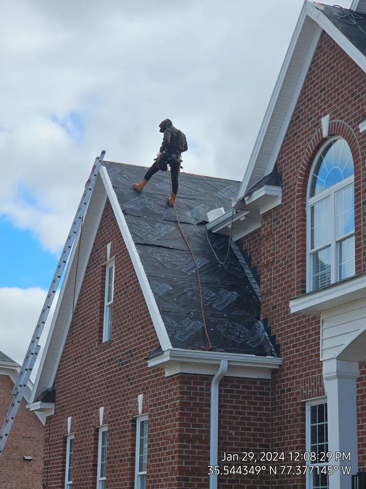 Slide of Roofing Solutions NC
