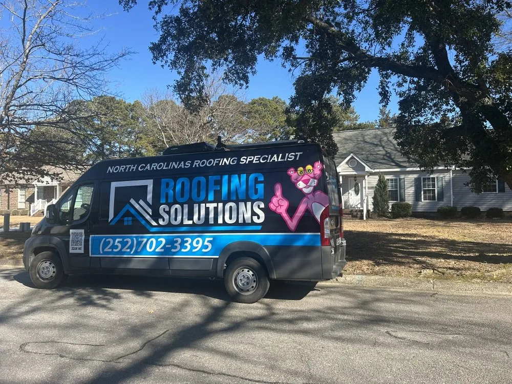 Slide of Roofing Solutions NC