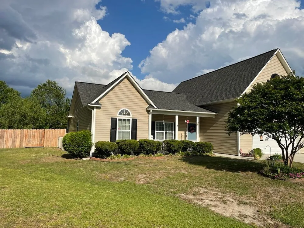 Slide of Roofing Solutions NC