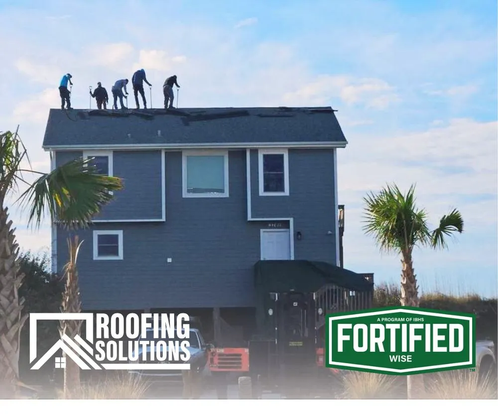 Slide of Roofing Solutions NC